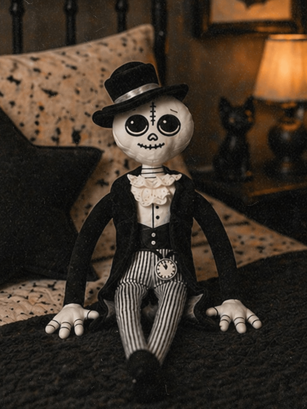 Gothic Papa Dread Halloween Guardian Plush Doll sitting on a bed, ready to chase away nighttime fears.