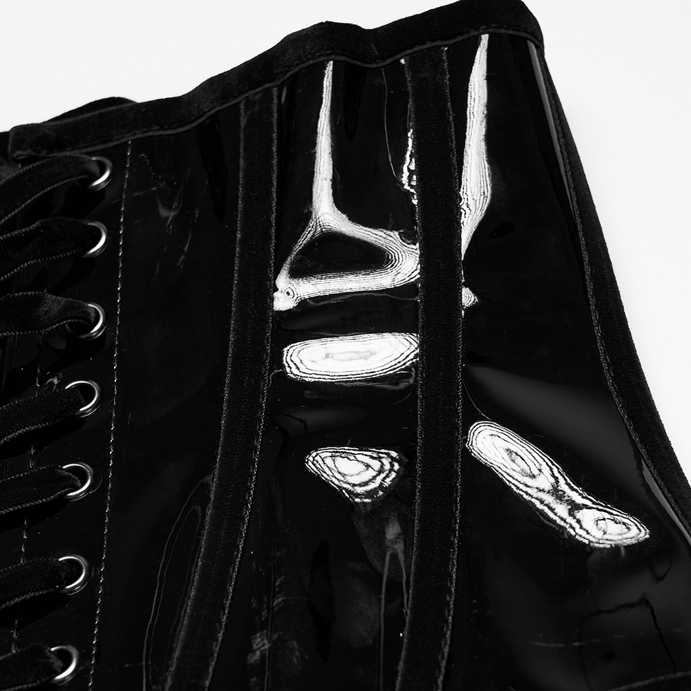Close-up of a gothic patent leather corset showcasing lace-up detail and glossy finish, perfect for a dramatic look.