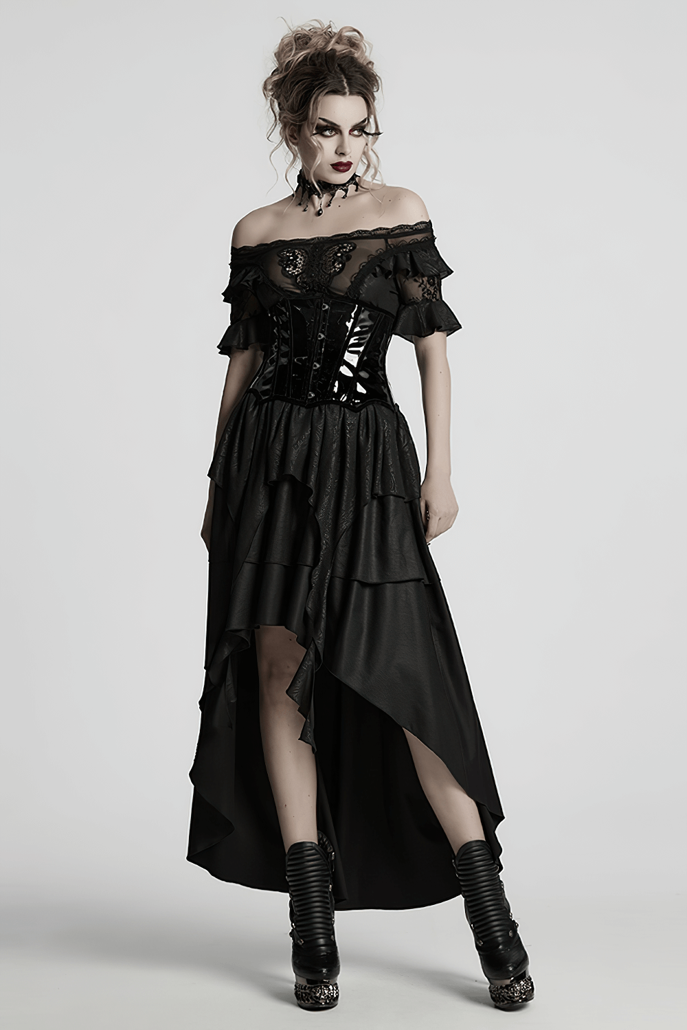 Gothic model in off-the-shoulder corset dress featuring patent leather and layered ruffles, styled with edgy accessories.