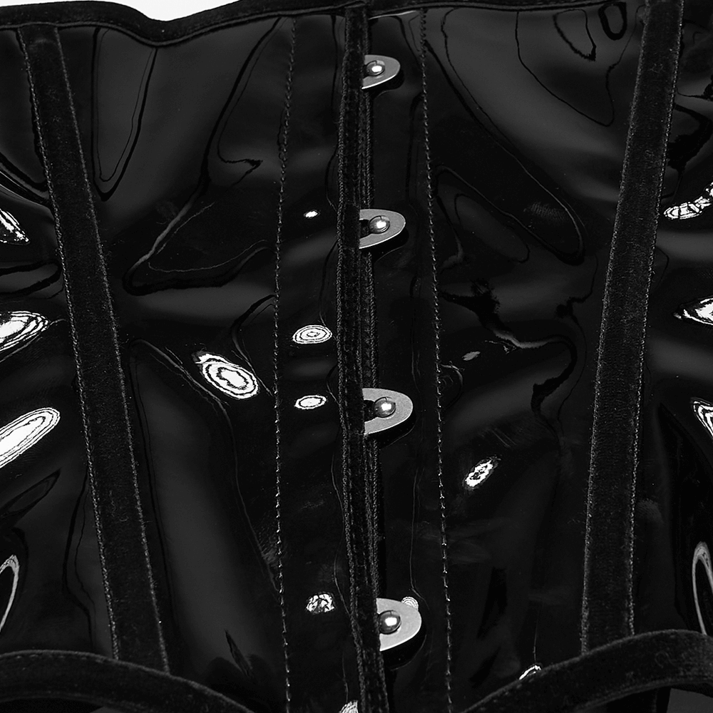 Close-up of gothic patent leather corset with metal buckles and glossy finish, showcasing intricate lacing and seaming details.