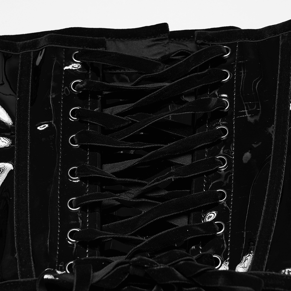 Close-up of gothic patent leather corset lace-up back, showcasing black laces and shiny finish for a dramatic look.