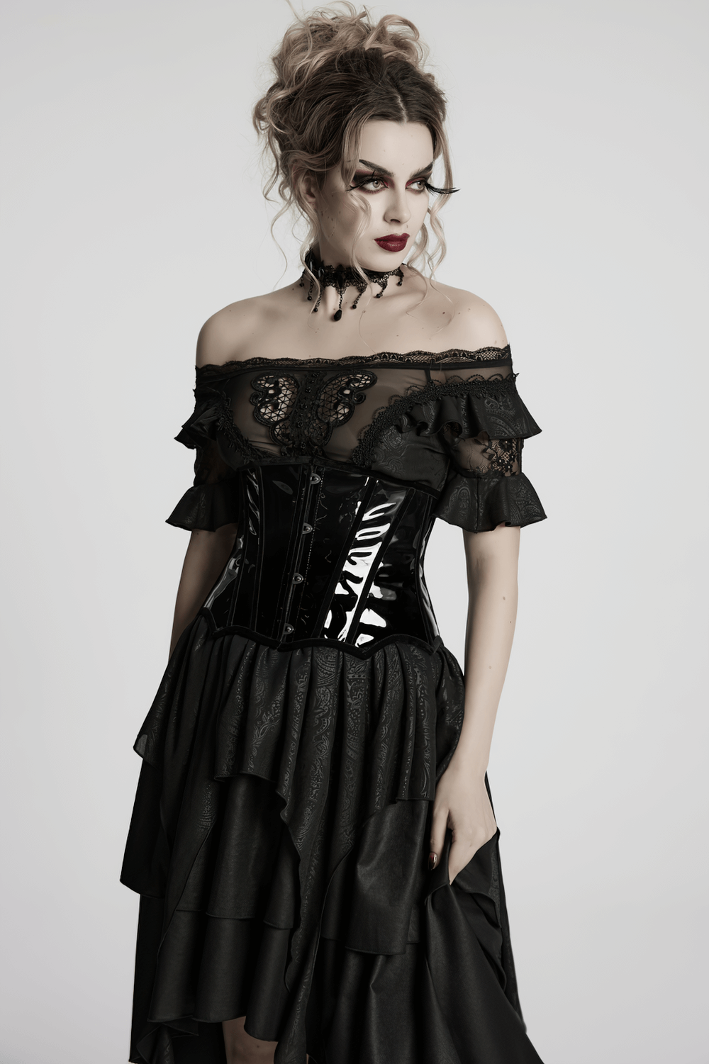 Gothic patent leather corset with lace-up back, showcasing a striking silhouette and edgy metal buckles.