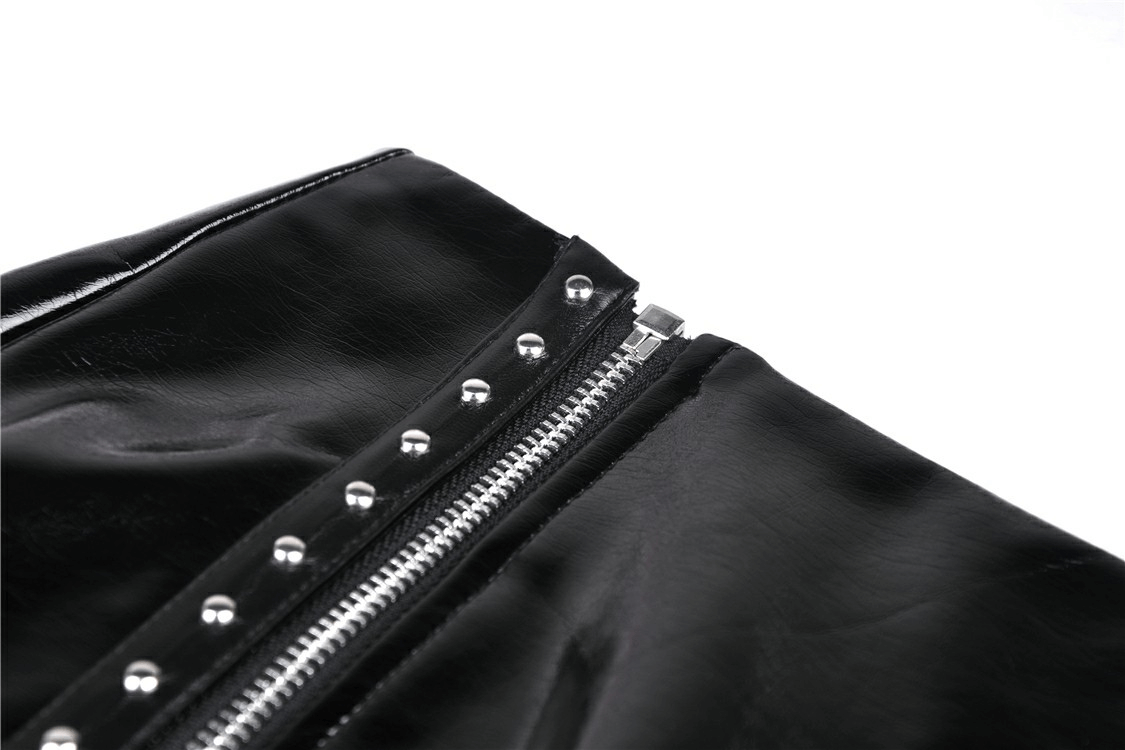Close-up of the zipper detail on a gothic patent leather mini skirt with studs, showcasing edgy fashion elements.
