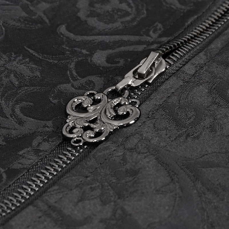 Close-up of intricate zipper detail on a gothic patterned black coat.