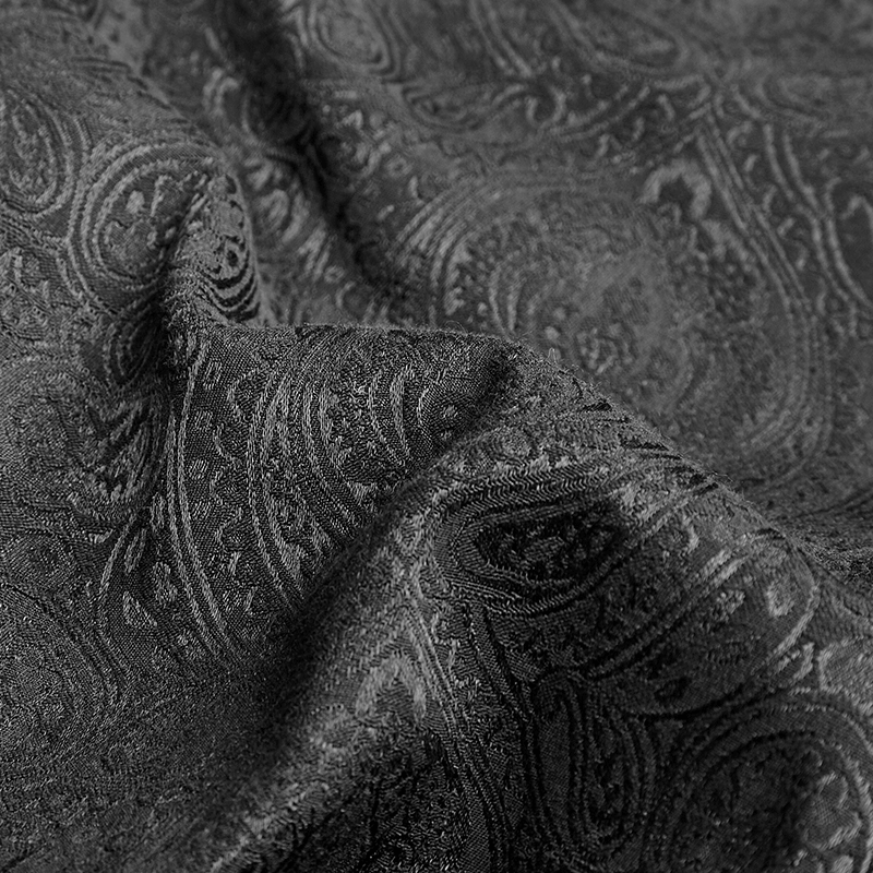 Elegant black jacquard fabric featuring intricate patterns, perfect for Gothic-inspired clothing.