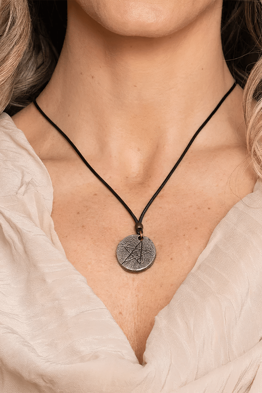 Gothic Pentagram Pewter Protection Pendant Necklace worn on a black cord, showcasing a medieval-style pewter disc.