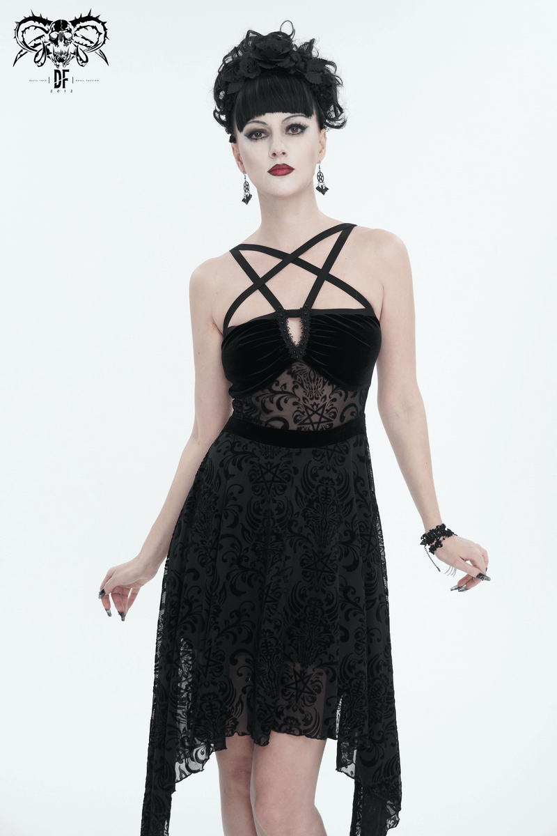 Woman in a gothic pentagram strappy black dress showcasing vintage elegance with an asymmetrical design.