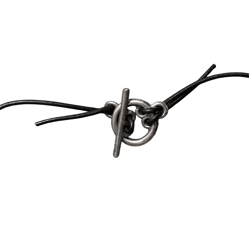 Gothic Pewter Crucifix Necklace with Balkan Amulet showing the black cord clasp detail for secure wearing.