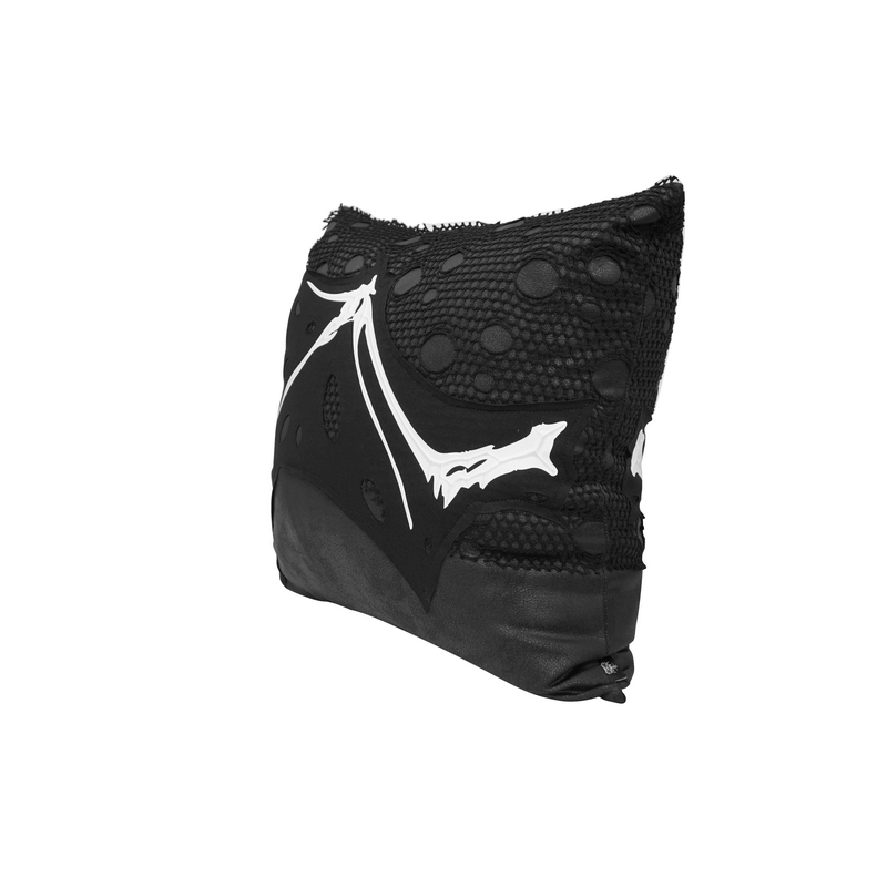 Gothic black pillow with wing bone print and mesh detail for stylish room decor.