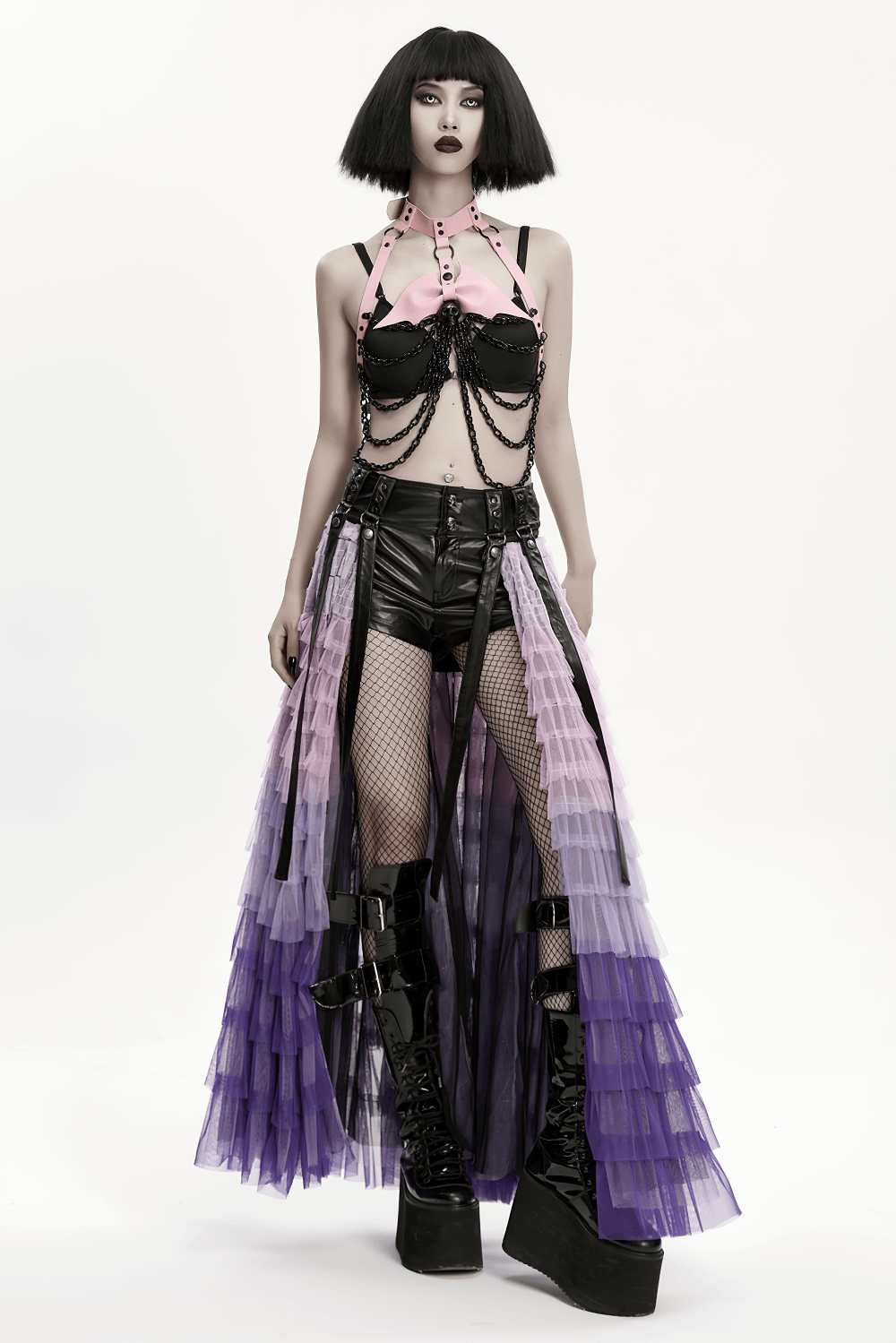 Gothic Pink Leather Harness with Skull and Chains showcased by a model in a dramatic fashion pose.