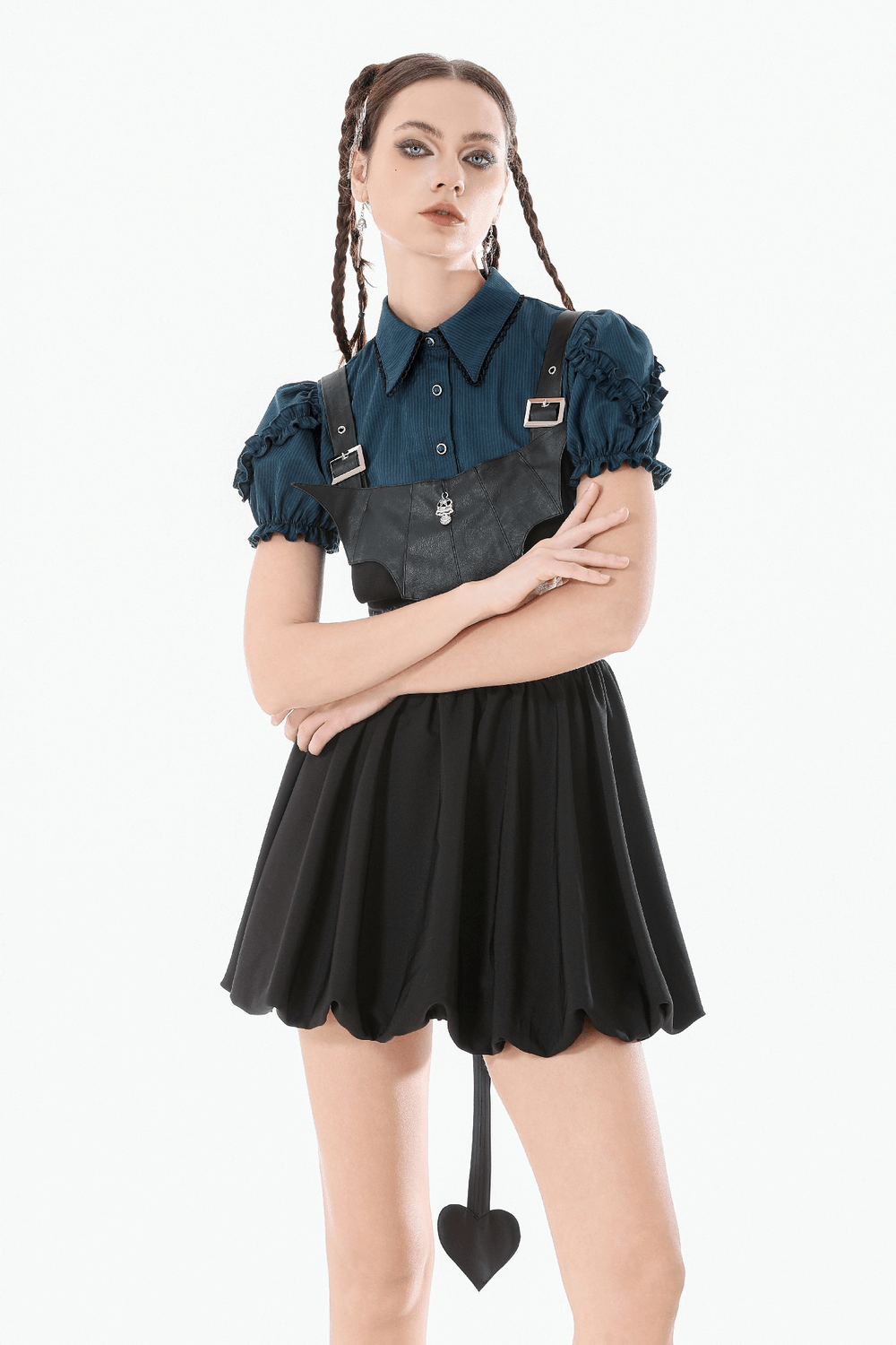 Gothic Pinstripe Puff Sleeved Blouse with Bat Brooch worn with a stylish black skirt and edgy accessories.