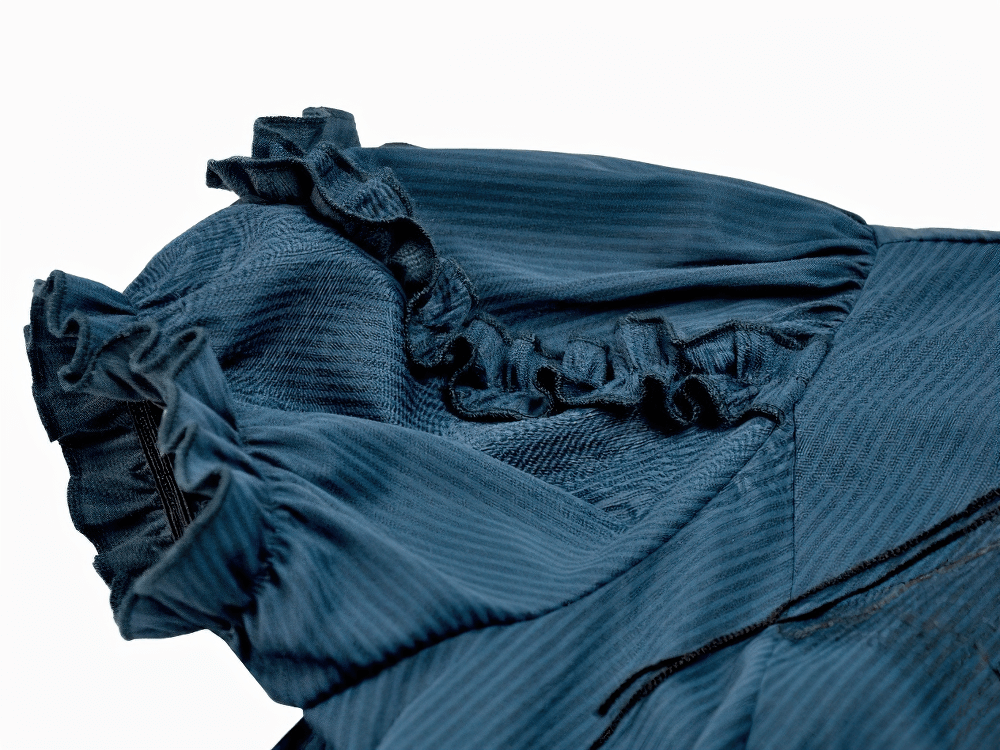 Gothic Pinstripe Puff Sleeved Blouse with Bat Brooch featuring a ruffled collar and textured fabric detail.