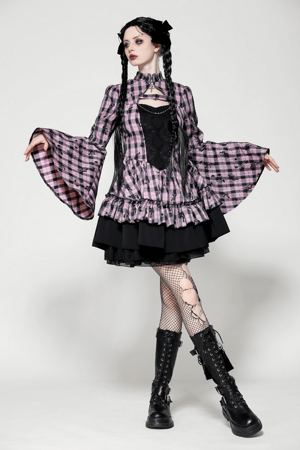 Gothic plaid dress with bell sleeves and lace details, perfect for a punk-inspired outfit.