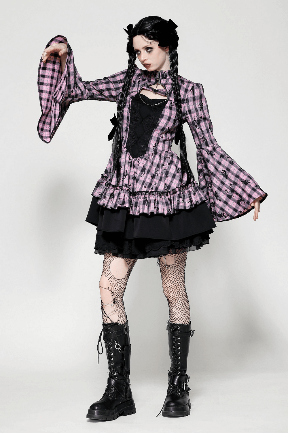 Gothic plaid dress with bell sleeves and lace details, embodying dark elegance and punk style.