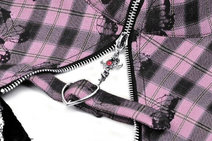 Gothic plaid dress detail featuring a black lace zipper with heart charm and pink plaid pattern.