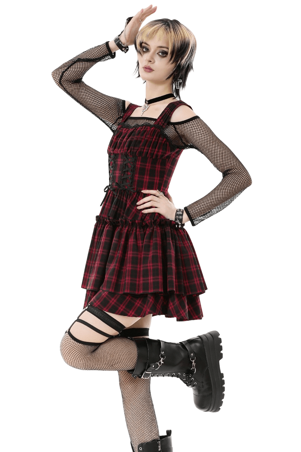 Gothic Plaid Dress with Lace-Up and Ruffled Skirt modeled by an alternative fashion enthusiast.