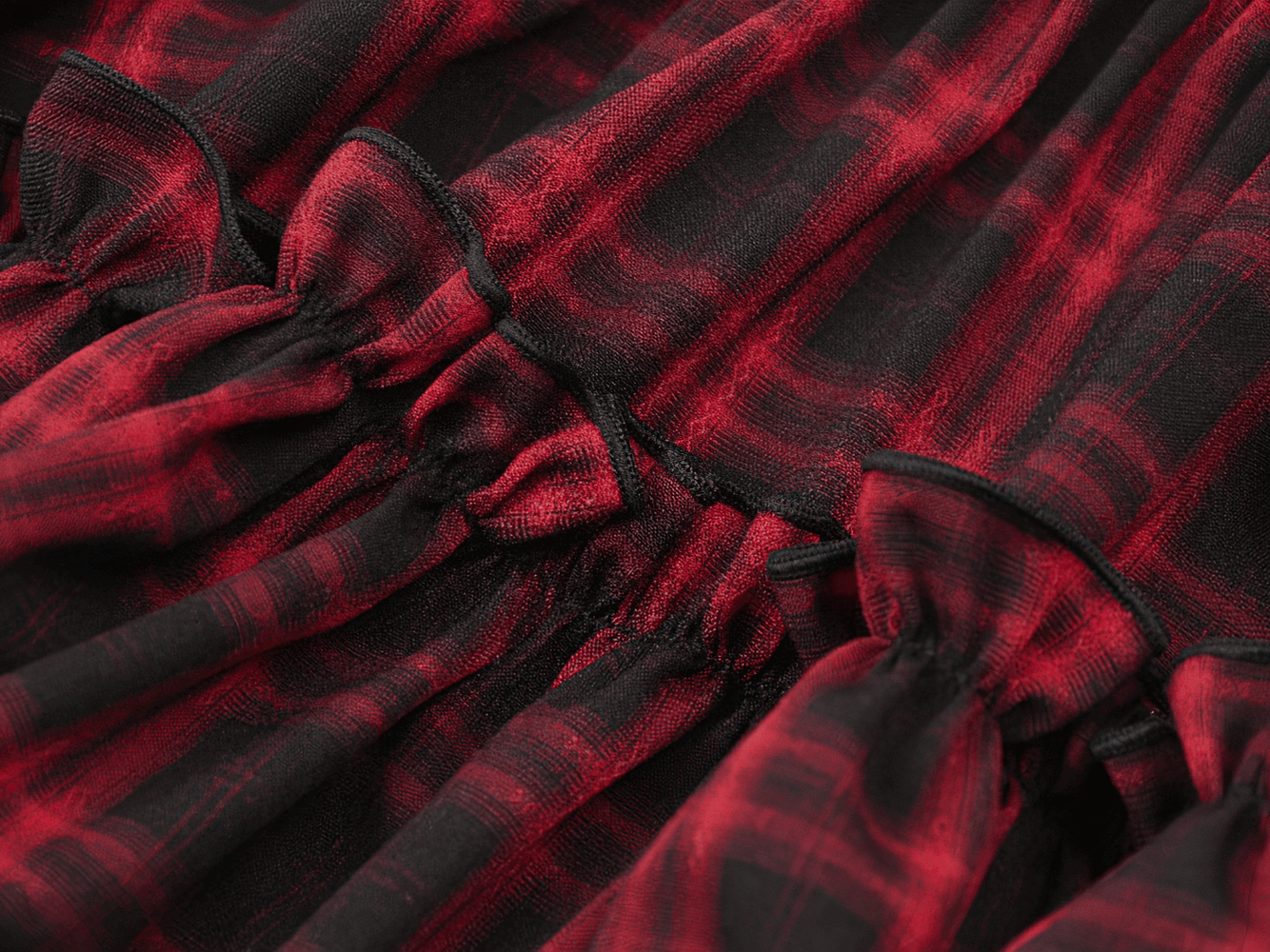 Gothic Plaid Dress with Lace-Up and Ruffled Skirt featuring red and black plaid pattern and playful ruffles.