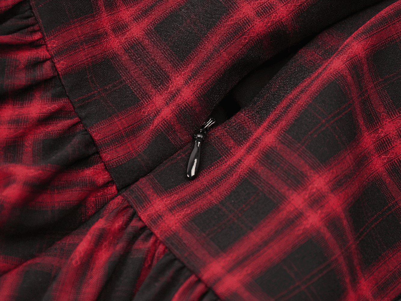 Gothic Plaid Dress with Lace-Up and Ruffled Skirt showcasing detailed plaid fabric and stylish ruffled hem.