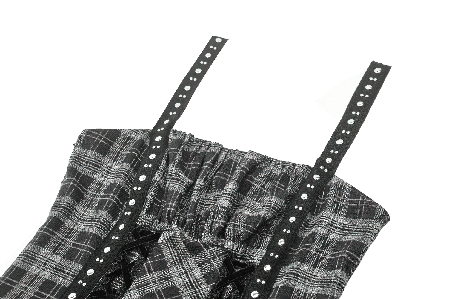 Close-up of Gothic plaid mini dress straps with studded detailing and lace trim. Perfect for punk-inspired fashion.