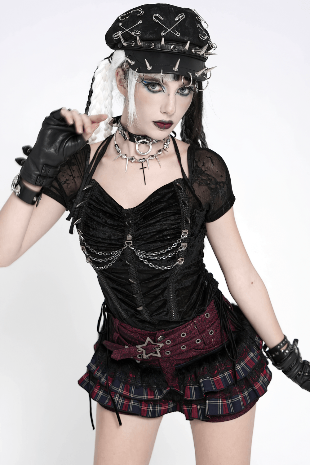 Gothic Plaid Ruffle Shorts with Star Belt Detail showcased in stylish punk attire with edgy accessories.