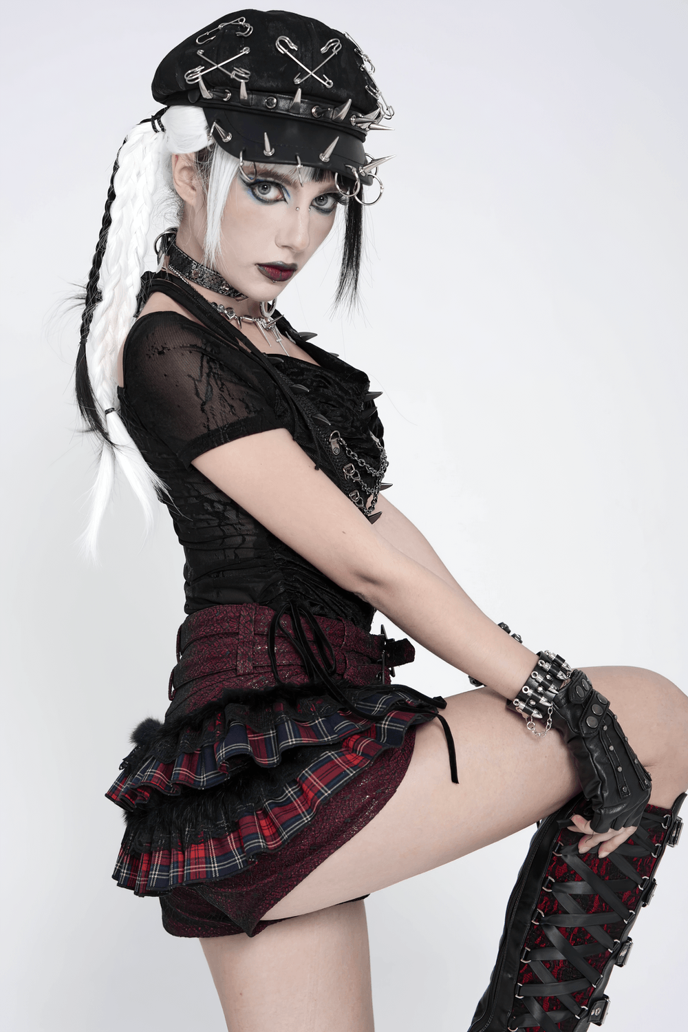 Gothic Plaid Ruffle Shorts with Star Belt Detail, showcasing edgy fashion style with a gothic twist.