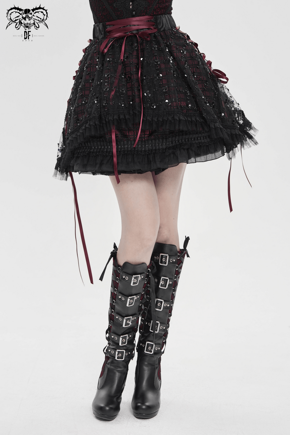Gothic Plaid Tulle Layered Skirt with Ribbon Luffles paired with stylish black buckle boots.