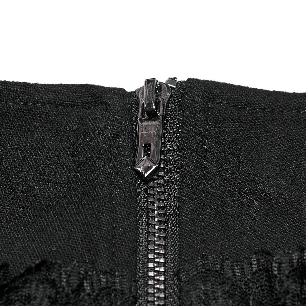 Close-up of the invisible side zipper on a gothic pleated mini skirt, showcasing its sleek design and functionality.