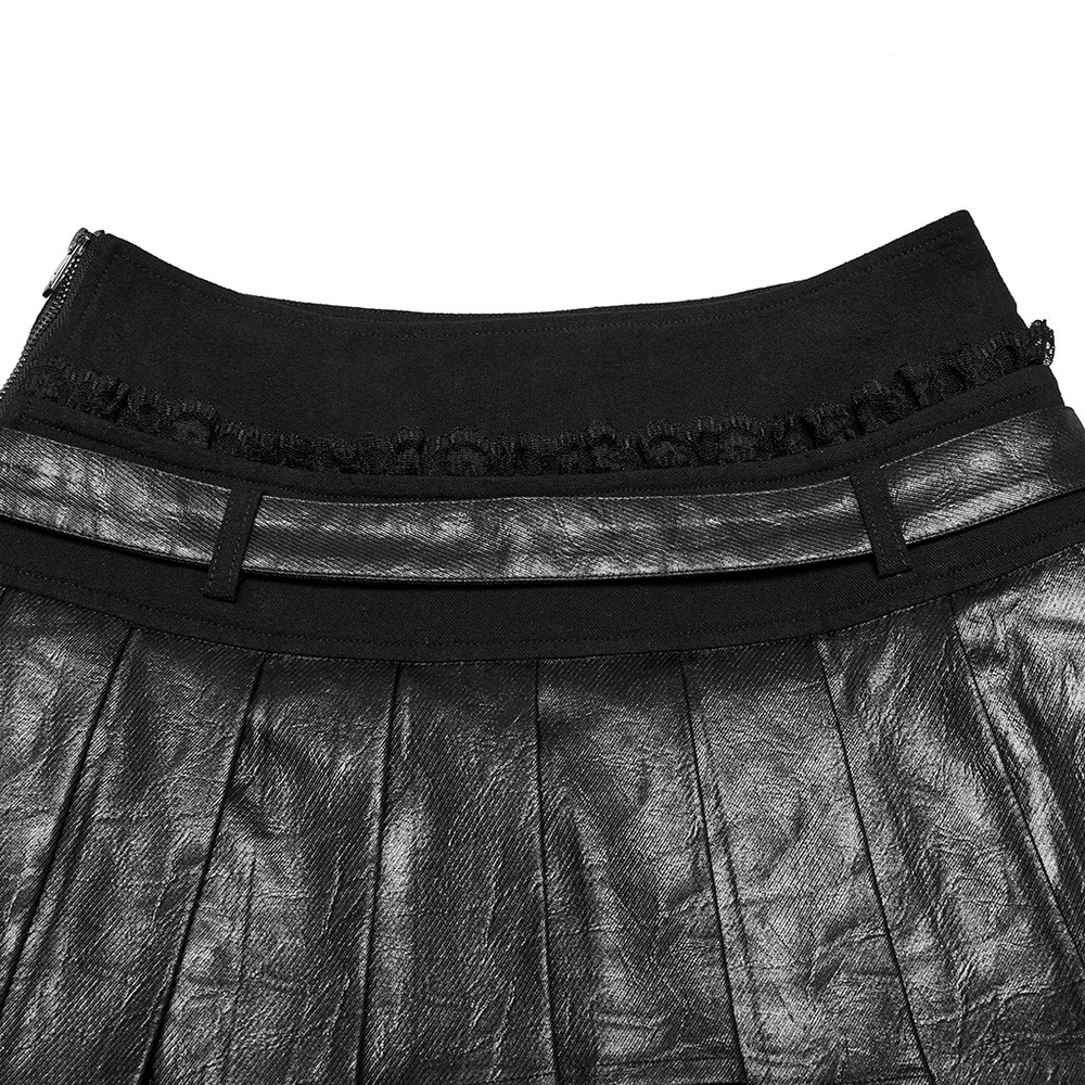 Close-up of Gothic pleated mini skirt with faux leather waistband and ruffled lace detailing for punk style.