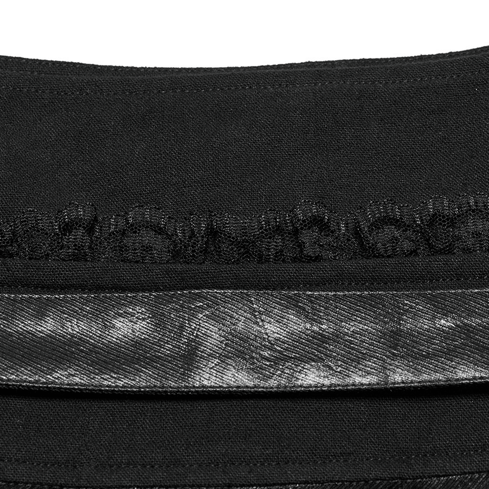 Close-up of gothic pleated mini skirt showcasing ruffled lace and faux leather details, emphasizing edgy punk style.