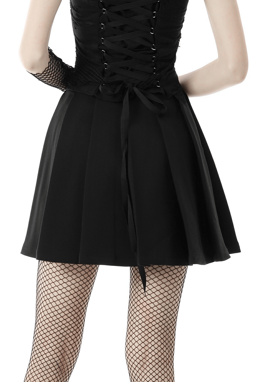 Back view of a Gothic pleated mini skirt showcasing its stylish design and eyelet strap details.
