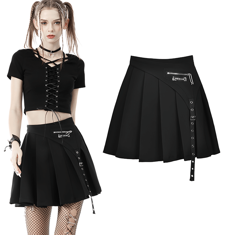 Gothic pleated mini skirt with side zipper detail paired with a black crop top and fishnet stockings.