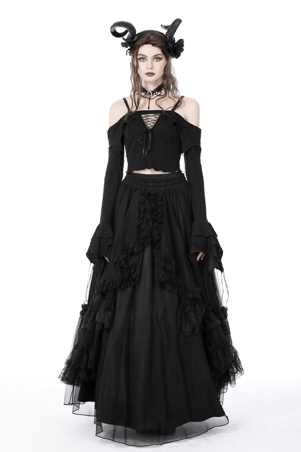 Gothic off-shoulder crop top with ruffles and dramatic skirt, embodying steampunk darkwear style.