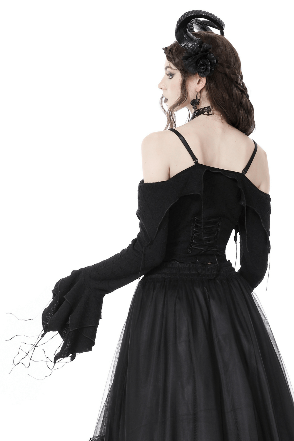 Back view of a gothic off-shoulder crop top with ruffles, paired with a dark tulle skirt, perfect for edgy style.