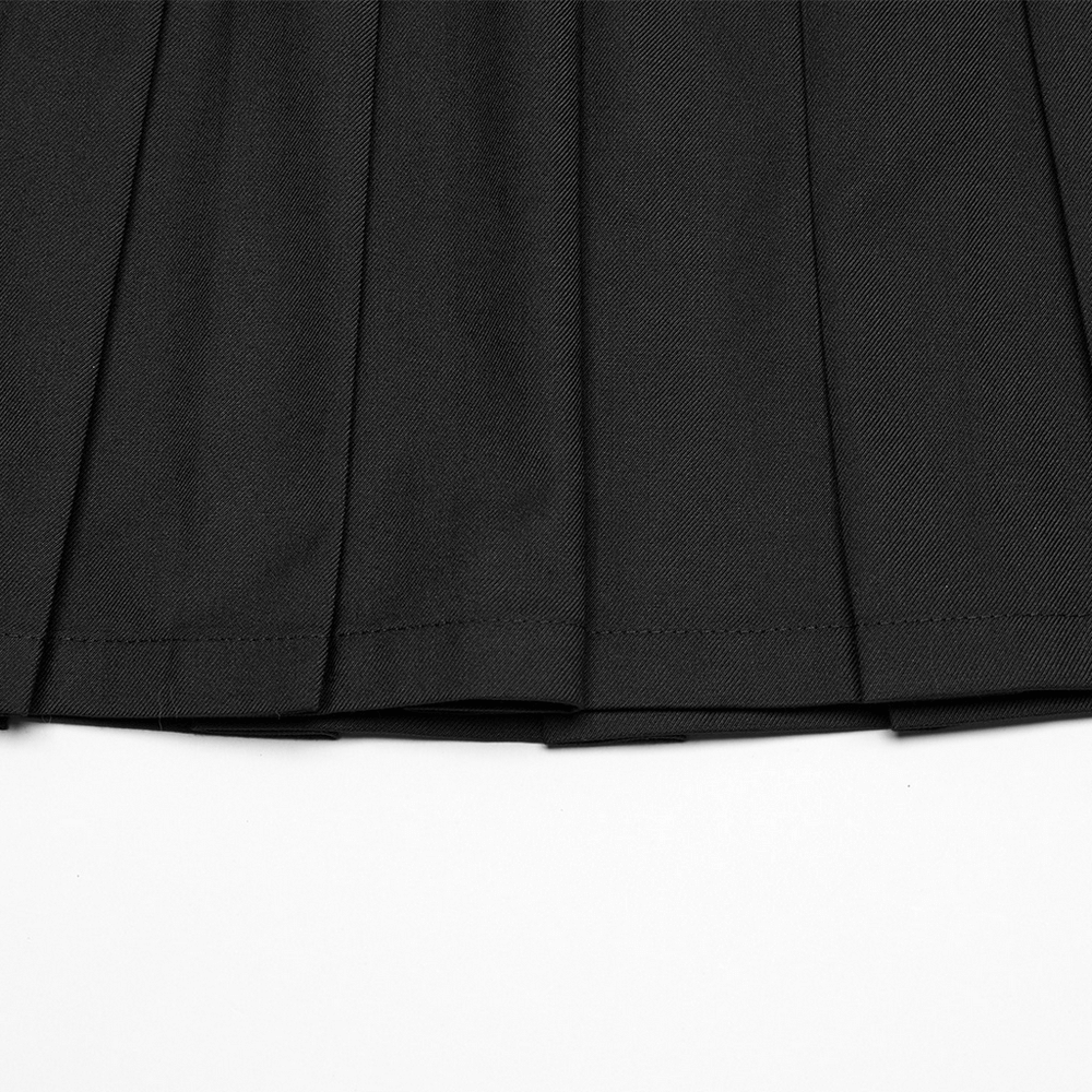 Close-up of a Gothic pleated skirt with detailed pleats, showcasing a bold black fabric design.