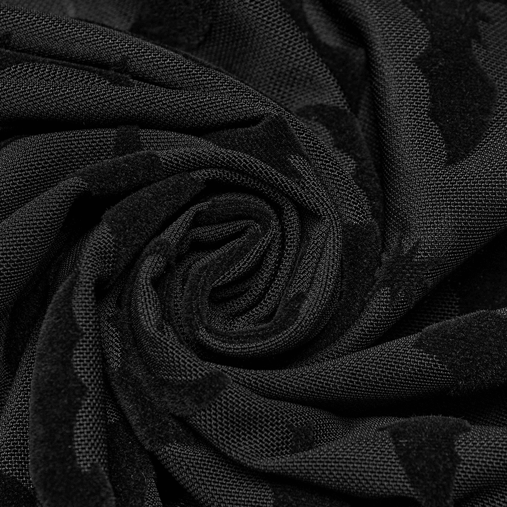 Close-up of black bat-flocked mesh fabric, showcasing its intricate texture and gothic allure, perfect for a grunge style top.