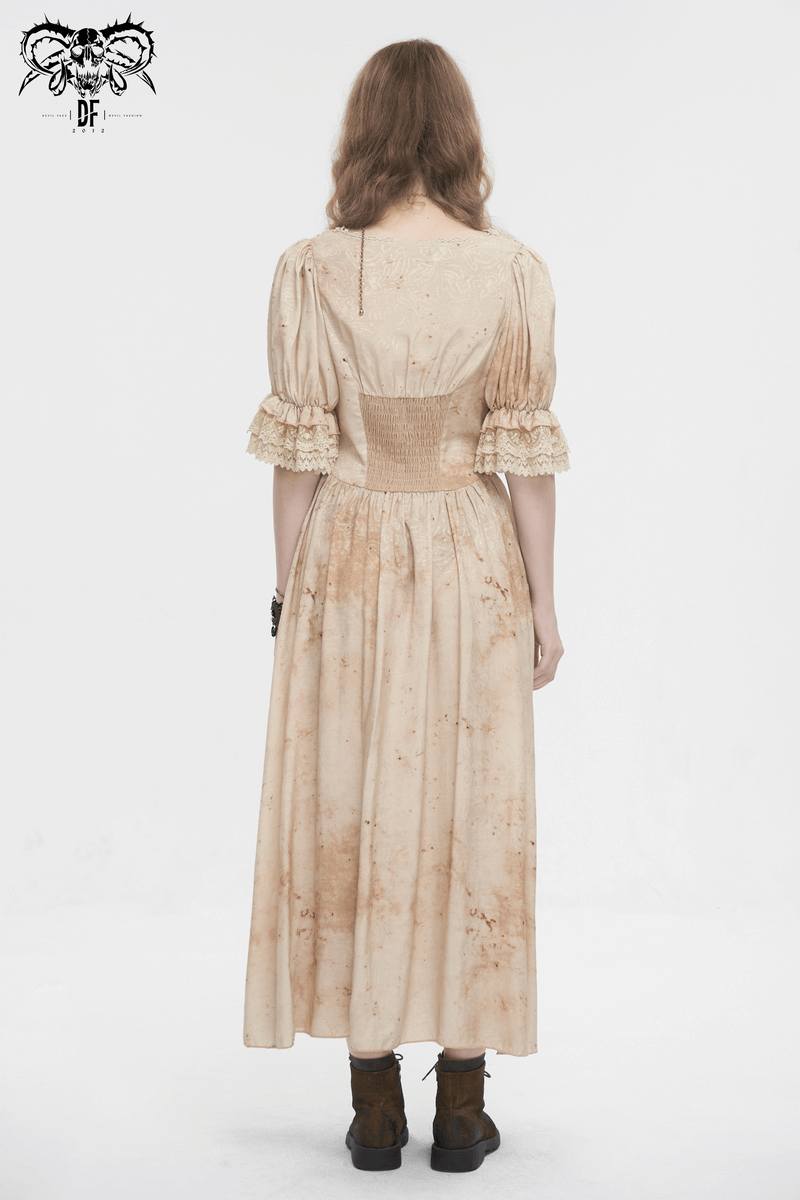 Back view of a vintage-style beige dress with puff sleeves and a shirred bodice, showcasing gothic elegance.
