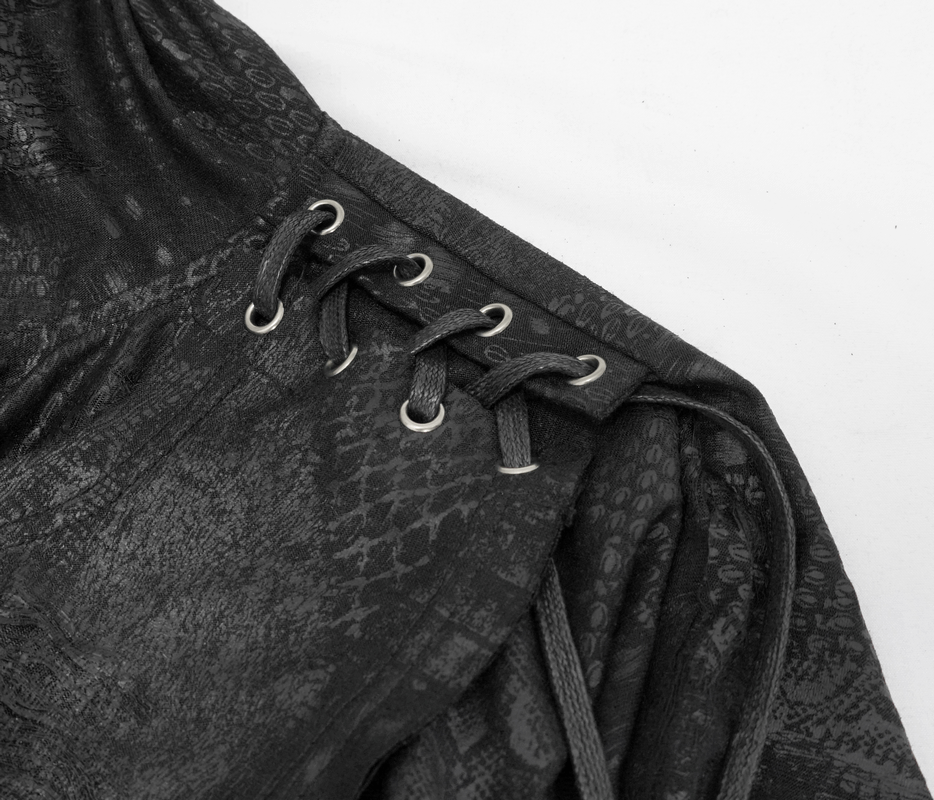 Close-up of lace-up detail on a women's gothic punk asymmetrical black cape.