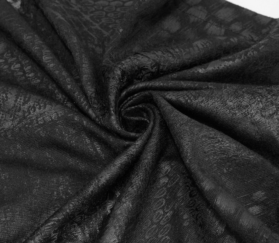 Black textured fabric for gothic style garments with a luxurious feel and vintage charm.