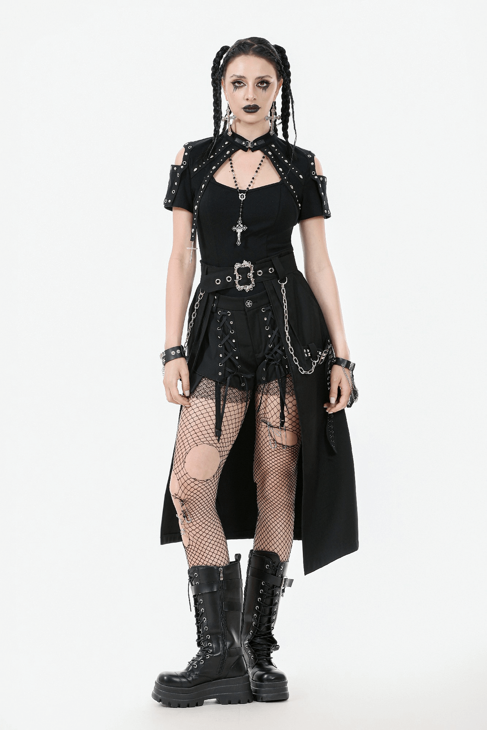 Gothic punk fashion outfit featuring chains, buckle details, and fishnet stockings, styled for edgy streetwear vibes.