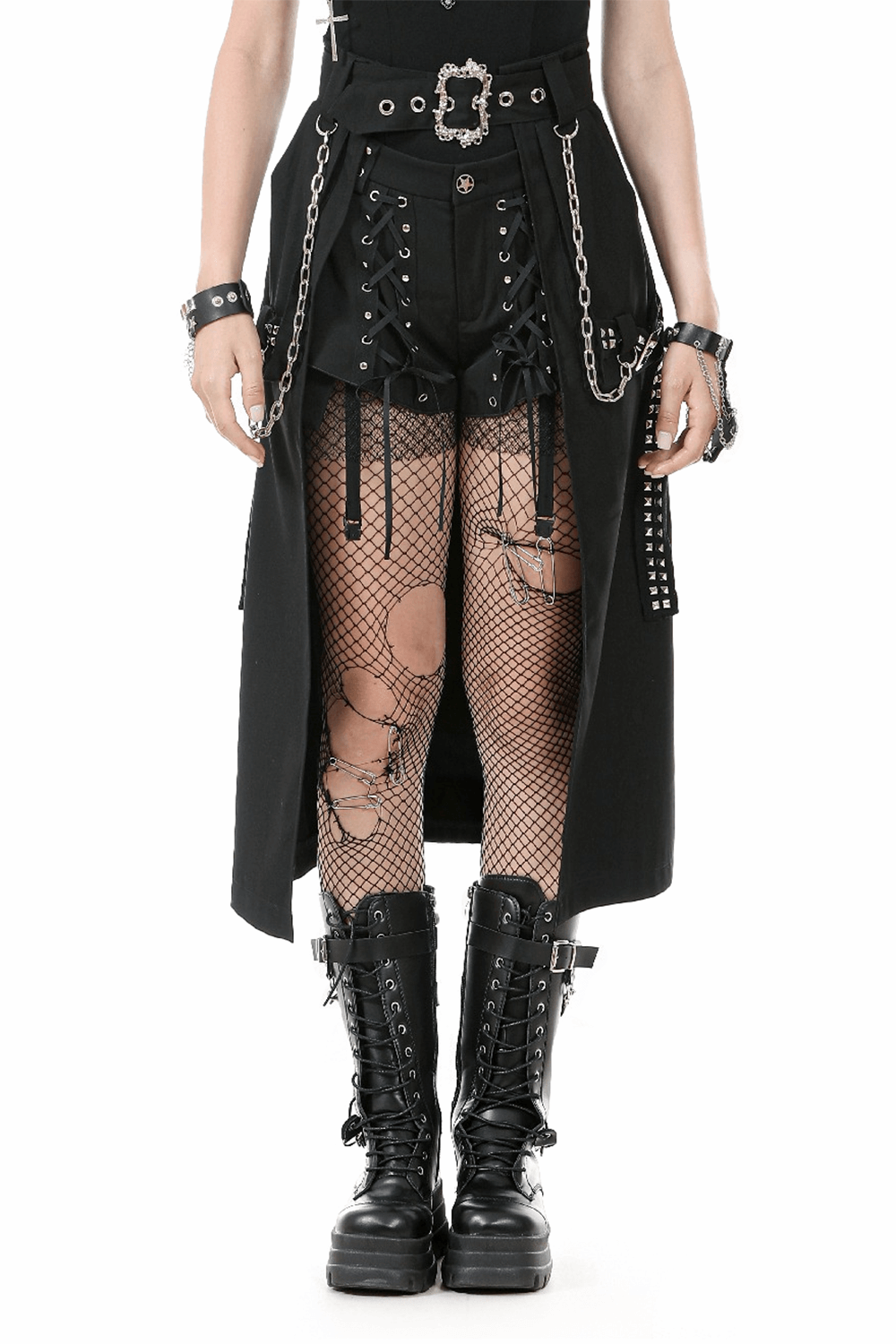 Gothic punk belted skirt with chains and buckle detail, paired with fishnet stockings and chunky platform boots.
