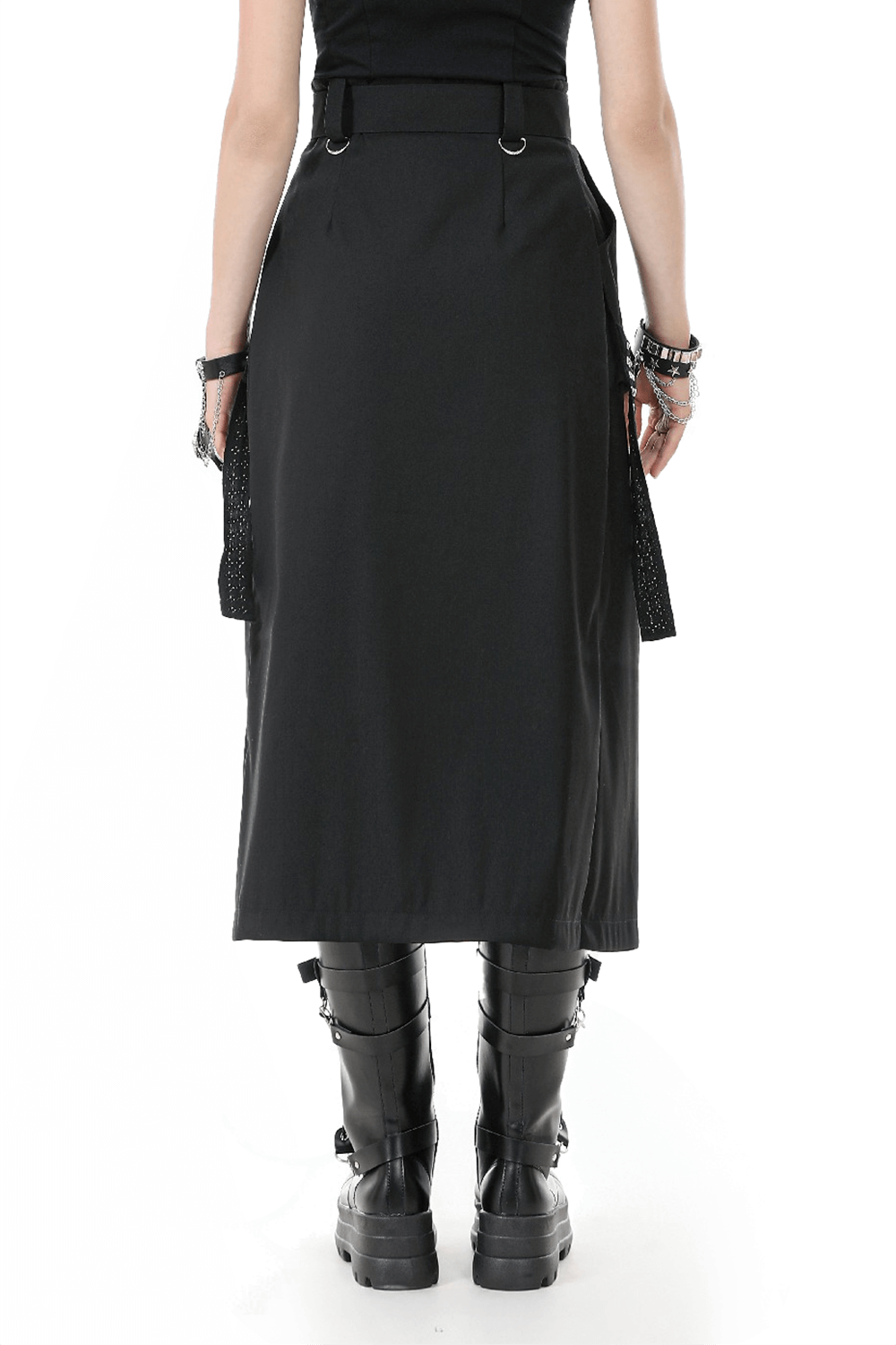Back view of a black gothic punk belted skirt with chains, paired with chunky platform boots.