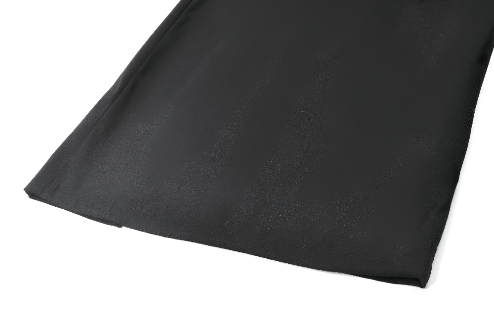 Close-up of a black A-line skirt showcasing smooth fabric, perfect for gothic punk streetwear style.