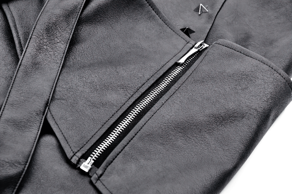 Close-up of gothic punk black faux leather mini skirt showing zipper and buckle strap details.