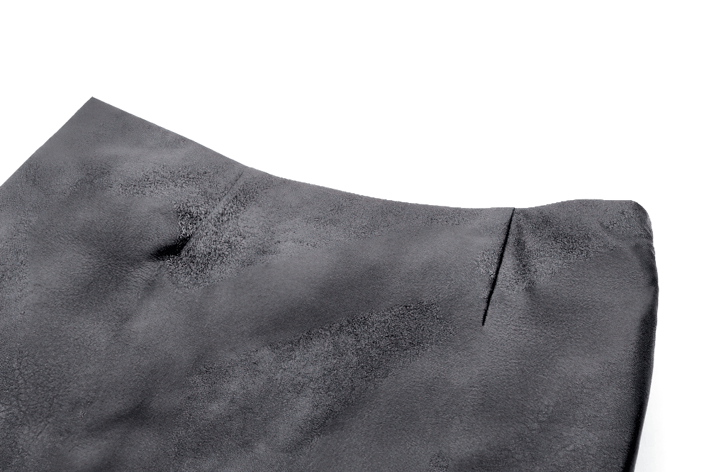 Close-up of the gothic punk black faux leather mini skirt showcasing the textured fabric and sleek design.