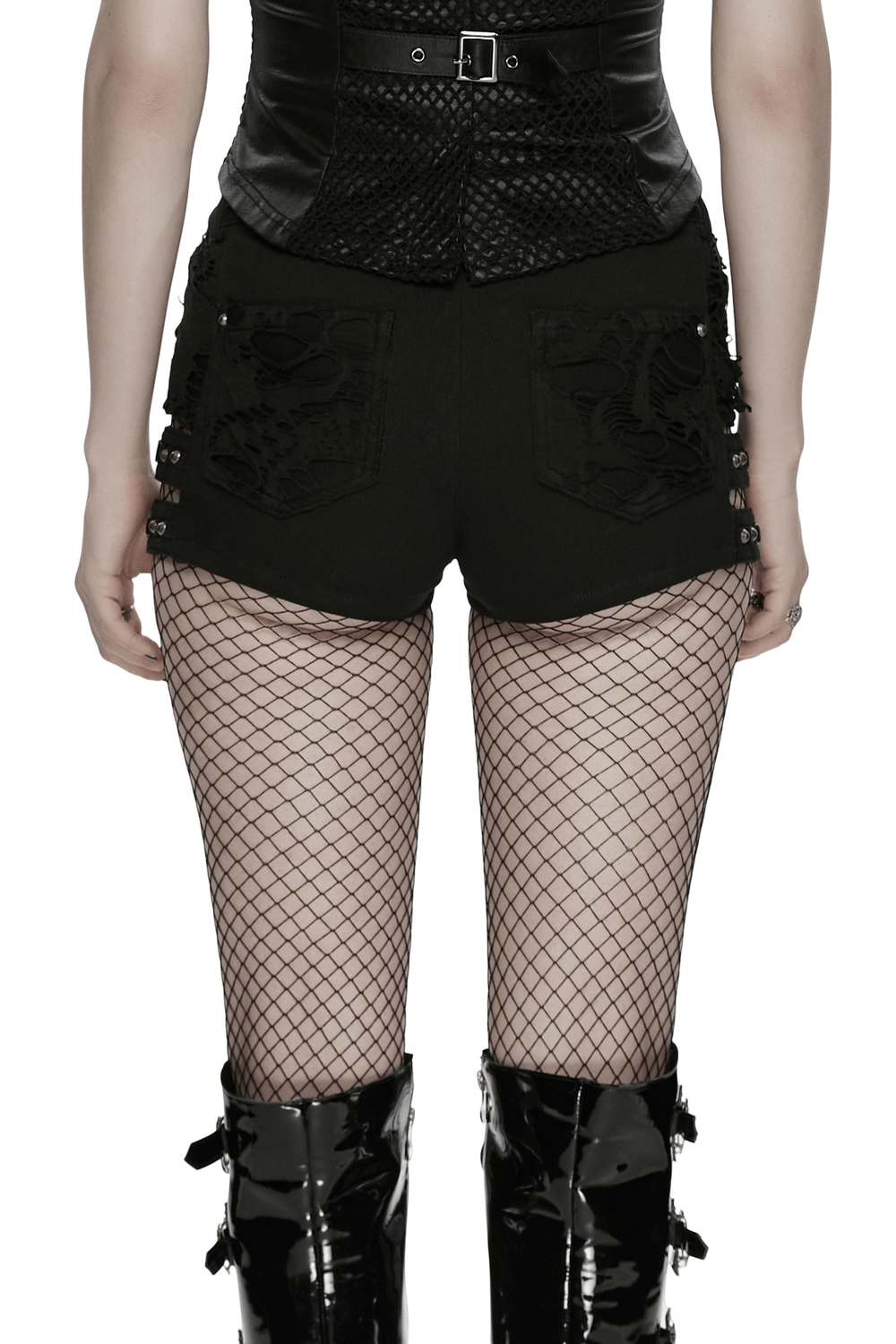 Gothic Punk Cutout Denim Shorts with Harness Straps worn with fishnet stockings, showcasing the daring punk style.