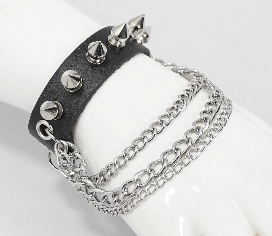Gothic punk faux leather bracelet with spikes and chains, stylish unisex accessory in black.