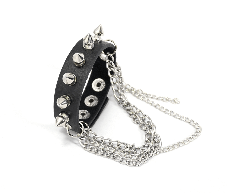 Black faux leather bracelet with spikes and chains, perfect for punk style outfits.