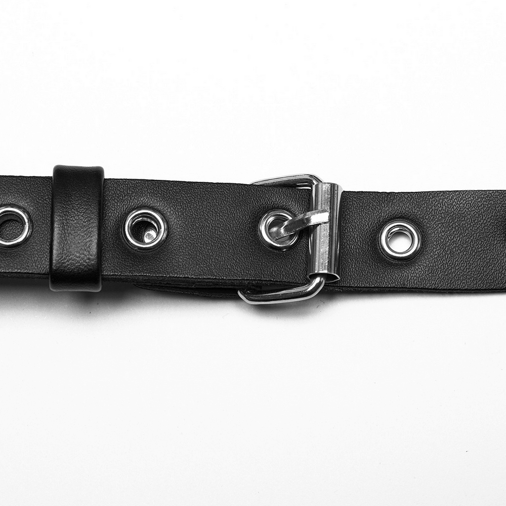 Close-up of black artificial leather strap with silver metal buckle and eyelets from Gothic Punk Halter Harness.