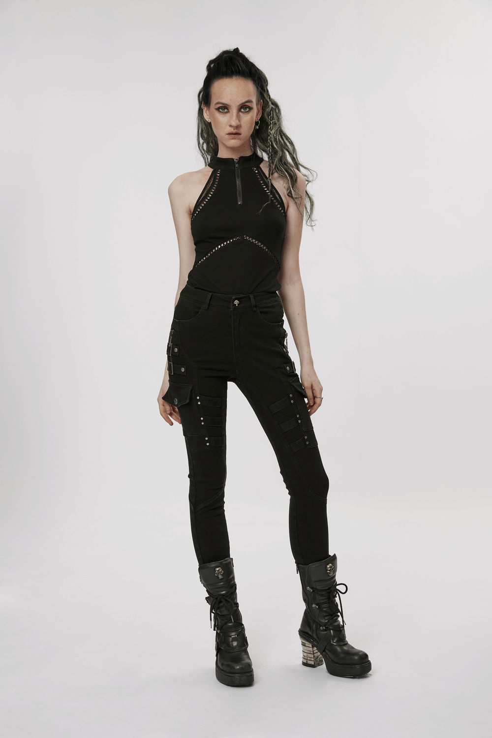 Gothic punk halter mesh tank top with zipper front, paired with edgy cargo pants and chunky boots.