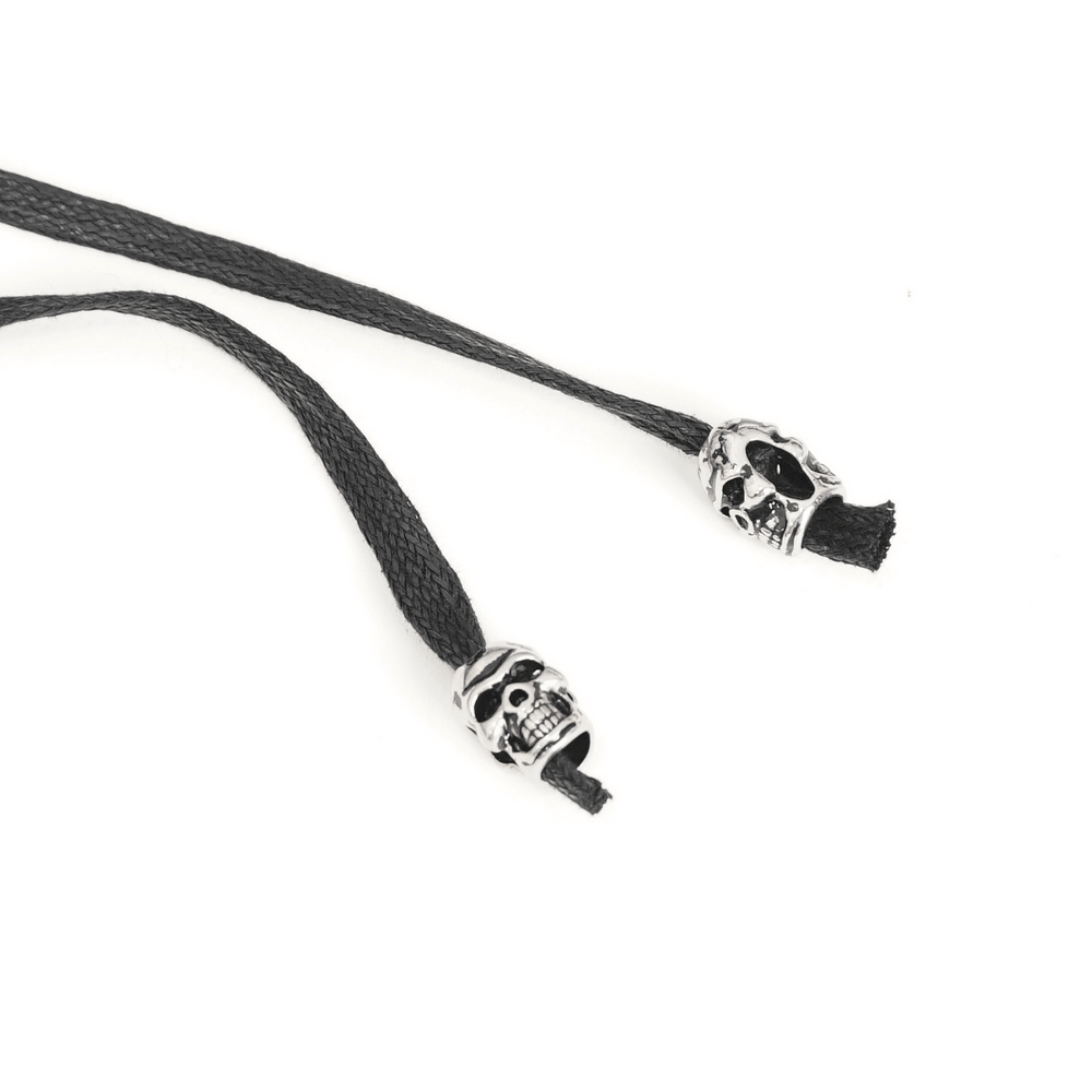Black braided cords with silver skull bead ends, perfect for gothic and punk accessories.